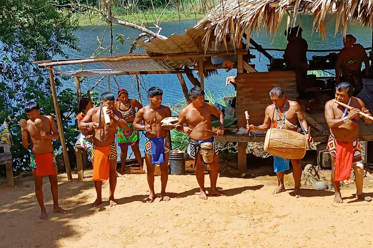 Discover Emberá culture with canoe rides, waterfalls, and traditional experiences. - Photo 3
